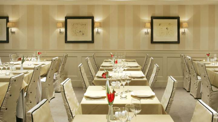 White Chairs And Tables in Resturant